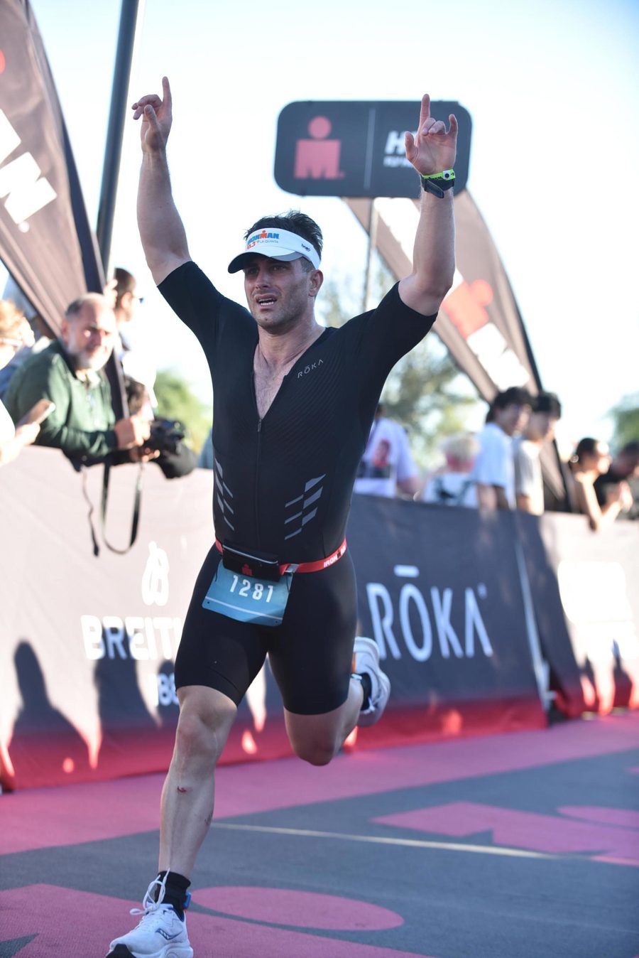 Gregory Schwing finishing IRONMAN 70.3 La Quinta